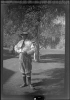 H. H. West stands on the golf course at Sunset Canyon Country Club, Burbank, about 1930