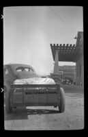 Forrest Whitaker's car with a trailer behind it parked at a rest stop, Little Lake, 1940