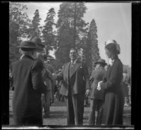 Sam Longstreet shakes Ralph Hiatt's hand at the Iowa Picnic in Lincoln Park, Los Angeles, 1940