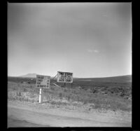 Signs posted along the roadside, Winnemucca vicinity, 1942