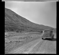 H. H. West's Buick parked alongside the Deschutes River, Wasco County, 1942