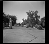 Funeral procession entering a cemetery, Portland vicinity?, 1942