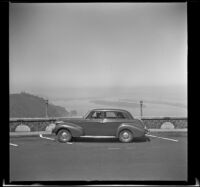 H. H. West's Buick parked at the Crown Point rest and viewing area, Corbett, 1942