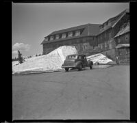 H. H. West's Buick parked next to a snow pile outside Crater Lake Lodge, Crater Lake National Park, 1942