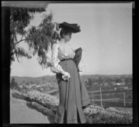Mary West stands on a path at Elysian Park, Los Angeles, about 1904