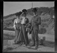 Mary West and Harriet and Wilfrid Cline stand by the reservoir in Elysian Park, Los Angeles, about 1904