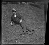 H. H. West reclines on the grass in MacArthur (Westlake) Park, Los Angeles, about 1898