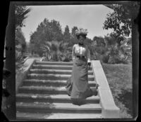 Daisy Kellum walks down steps in MacArthur (Westlake) Park, Los Angeles, about 1898