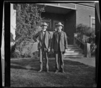Wilson West and Wayne West stand in the West's front yard, Los Angeles, about 1899