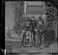 James Pirie, Wayne West, and John Herwick pose next to the West's house with two other men, Los Angeles, about 1900