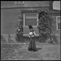 Ellen Lorene (Pinkie) Lemberger poses next to the West's house, Los Angeles, 1901