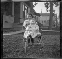 Elizabeth and Frances West on the front lawn of a house, Los Angeles, about 1907