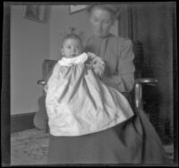 Mary West holds her baby daughter, Elizabeth, Los Angeles, about 1903