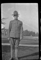 Unidentified solider stands on the West's front lawn, Los Angeles, about 1916