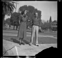 H. H. West Jr. and Jane Deming stand in front of the West's house, Los Angeles, 1937