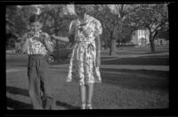 Richard and Dorothea Siemsen stand on the West's front lawn, Los Angeles, 1939