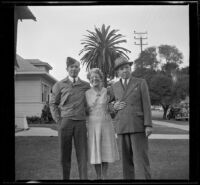 H. H. West poses with his wife and son, Los Angeles, 1941