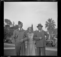 H. H. West poses with his wife and son, Los Angeles, 1941