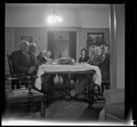 H. H. West and Mertie Whitaker West's family sit at the Thanksgiving table, Los Angeles, 1942