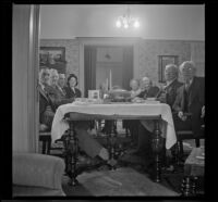 H. H. West and Mertie Whitaker West's family sit at the Thanksgiving table, Los Angeles, 1942