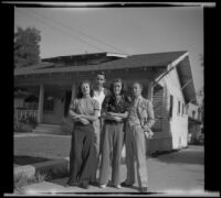 Margaret Deming, Jack Von Posch, Jane Deming and H. H. West, Jr. pose in front of the Deming home, Los Angeles, 1938