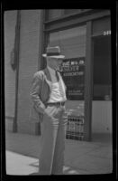 Ralph B. Clapp stands outside his office, Los Angeles, 1939