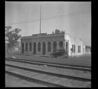 Former River Station depot for the Southern Pacific Railroad, viewed from across the tracks, Los Angeles, 1940
