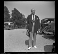 Dr. Bim Smith poses in a parking lot at Norwalk State Hospital, Norwalk, 1943