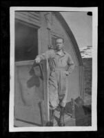 H. H. West, Jr. poses outside his quarters (photo), Dutch Harbor, 1943