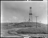 Oil wells, probably at the oil field at Kettleman Hills, Kings County, circa 1932