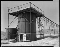 Storage tank in an oil field, California, 1930-1939