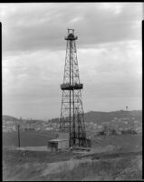 Oil well owned by C. E. D. Lewis, possibly at Signal Hill, Los Angeles, circa 1920-1930