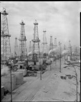 Venice oil field, looking north on Pacific Avenue, Los Angeles, 1930