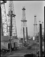 Oil wells, probably at the Venice oil field, Los Angeles, circa 1930