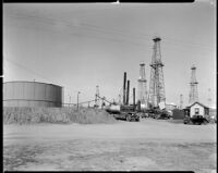 Oil wells near the office of the Pacific Drilling Corporation at the Playa del Rey oil field, Los Angeles, 1935