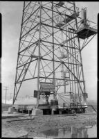 Close-up view of an oil well, California, 1930-1939