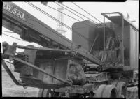 Maaco Construction Company truck crane parked at an oil field, Los Angeles, circa 1930