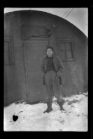 Corporal H. H. West, Jr. stands outside the Quonset hut at Fort Mears (negative), Dutch Harbor, 1942