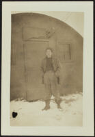 Corporal H. H. West, Jr. stands outside the Quonset hut at Fort Mears (photo, recto), Dutch Harbor, 1942