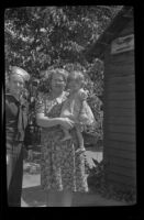 Paul West Deaver and Mrs. Blanche Sanders pose in the yard of her home, Monrovia, 1943