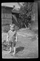 Dennis Albert Deaver stands in his grandparents' yard (negative), Sierra Madre, 1943