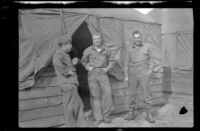 Jose Miller, David Sparks and Herman Schultz stand outside the barracks, Camp Murray, 1942