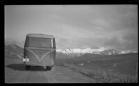 Rear view of the West's bus at the summit of a pass, Denali National Park and Preserve, 1946
