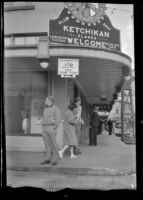 Ketchikan welcome sign standing on a street corner, Ketchikan, 1946
