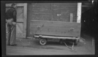 Coffin containing the remains of Ray W. Liebholz of Yakima, Washington, Seward, 1946