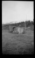 Distant view of the restrooms at Paxson Lodge, Gulkana vicinity, 1946