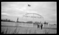 Mertie West, Frances Wells and W. L. Kinsell pose outside the front gate of Fort Richardson Post Cemetery, Fort Richardson, 1946