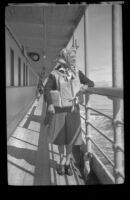 Mertie West wears a life preserver, Alaska en route, 1946