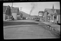 View looking down a street towards the dock, Valdez, 1946