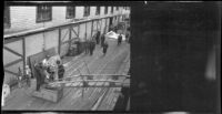 Drunk Merchant Marine being helped up the gangplank, Juneau, 1946